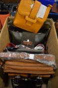 A quantity of ladies handbags.