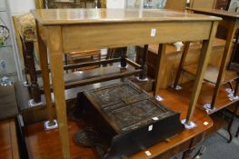 A mahogany side table.