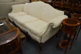 A good Georgian design cream upholstered humpback scroll-end three seater settee.