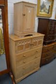 A limed oak bedroom chest with similar bedside cupboard.