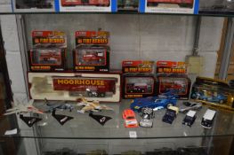 Three die-cast fighter jets, various other model vehicles, some boxed.