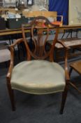 George III design mahogany framed shield back armchair.