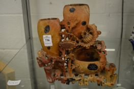 A Chinese carved soap stone vase group depicting flowers and birds.