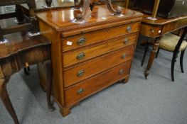 A 19th century mahogany straight front chest of drawers with brushing slide and four graduated