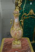 A good pair of marble and ormolu twin handled urn shaped classical design table lamps.