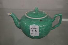 A small Chinese turquoise glazed teapot.