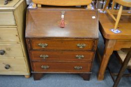 An Edwardian mahogany bureau.