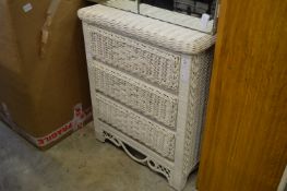 A wicker chest of drawers.
