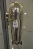 A Zeppelin shaped cocktail shaker.