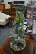 Majolica jardiniere stand, the base with moulded elephant.