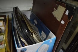 A large quantity of unframed paintings, prints etc.