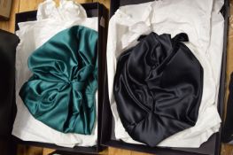 Two Prada ladies hats, boxed.