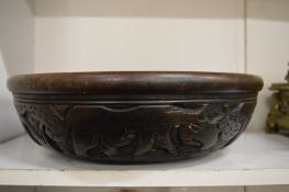 An African carved wood bowl.
