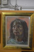 A 20th century pastel portrait of a South East Asian women.