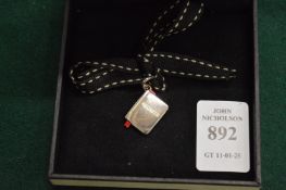 A Links of London book shaped pendant.