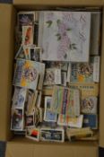 A large quantity of loose cigarette cards and some with original packaging.