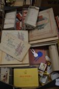 A quantity of cigarette cards in albums, playing cards etc.