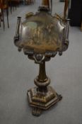 A good Victorian papier mache and gilt decorated adjustable music or reading stand, the top