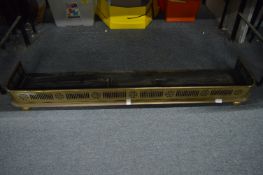 Pierced brass fender.