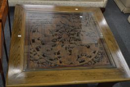 A good large Chinese design hardwood square shaped coffee table, the carved central panel