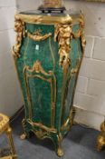A pair of large and impressive faux malachite, marble and ormolu pedestal stands.