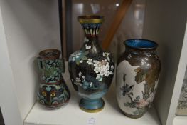 Three cloisonne vases.
