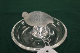 A Lalique pin tray mounted with a frosted glass partridge.
