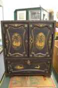 Japanese black lacquer and chinoiserie decorated table cabinet.