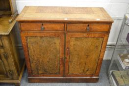 A 19th century burr wood side cabinet with two drawers and pair of panelled cupboard doors.