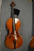 A cello, two piece back, appears unnamed together with an early cello case (cello body split, case