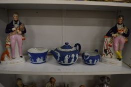A Wedgwood Jasperware three piece service and a pair of Staffordshire figures (faults).