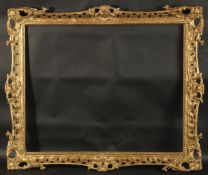A CHIPPENDALE GILTWOOD PICTURE FRAME Rebate size 27ins x 22ins