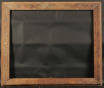 A CARVED PICTURE FRAME Rebate size 25ins x 36ins.
