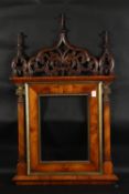 A 19th Century Italian walnut tabernacle frame with carved scrolling top ornament, rebate size 15