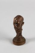 A BRONZE HITLER REPLICA SEAL. 3ins high.