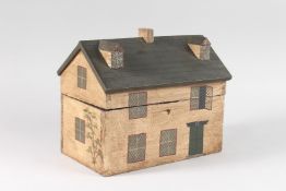 A REPLICA PAINTED WOODEN HOUSE TEA CADDY. 10ins high.