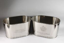 A SMALL PAIR OF LILY BOLLINGER WINE COOLERS. 16ins long x 9.5ins high.