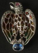 A SILVER PLIQUE-A-JOUR EAGLE COMBINED BROOCH AND PENDANT set with ruby eye, cabochon sapphire and