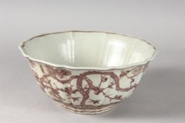 A CHINESE UNDERGLAZE RED PORCELAIN BOWL. 23cms wide.