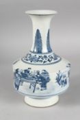 A CHINESE BLUE AND WHITE PORCELAIN VASE decorated with boys. 27cms high.