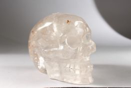 A LARGE CARVED ROCK CRYSTAL SKULL. 5.5ins high.
