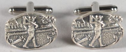 A PAIR OF SILVER GOLFING CUFFLINKS.