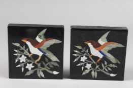 A PAIR OF PETRA DURA BIRD PLAQUES. 4ins square.