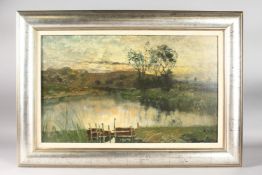 KARL HEFFNER. Sunset over the river. Signed. Oil on board. 14ins x 23ins.