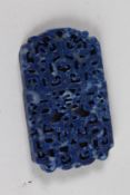 A CHINESE PIERCED AND CARVED LAPIS PENDANT. 3.5ins x 2ins.