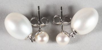 A PAIR OF 9CT WHITE GOLD PEARL DROP EARRINGS.