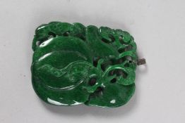 A PIERCED JADE PENDANT with silver top. 3.5ins x 2.5ins.
