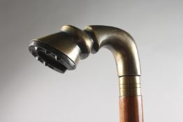 A WALKING STICK with horse's hoof handle.