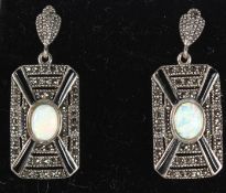 A PAIR OF SILVER OPAL AND ONYX DECO STYLE EARRINGS.
