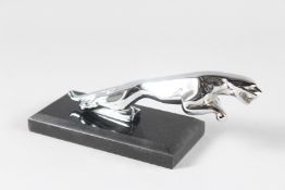 A CHROME JAGUAR CAR MASCOT.